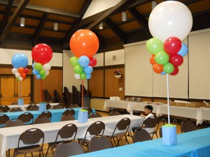 Party set up with balloons at each table
