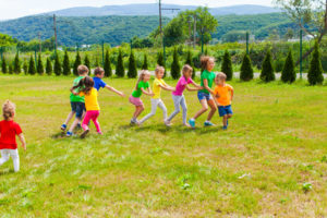 children playing outside at sleepaway camp