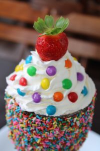 colorful cupcake with strawberry for virtual birthday party