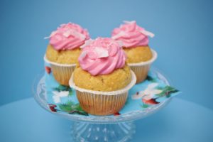 vanilla cupcakes with pink frosting