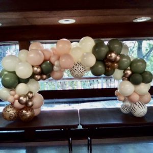 white pink green gold balloon arch