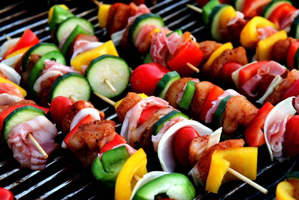 vegetable and meat kabobs on bbq