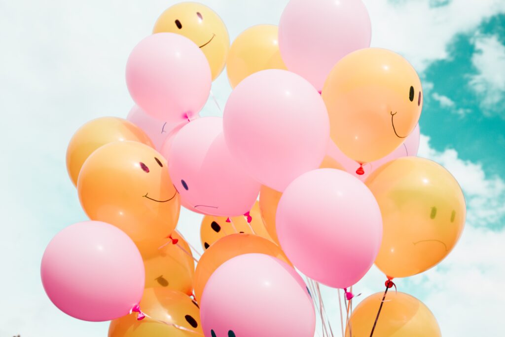 happy pink and orange pastel balloons